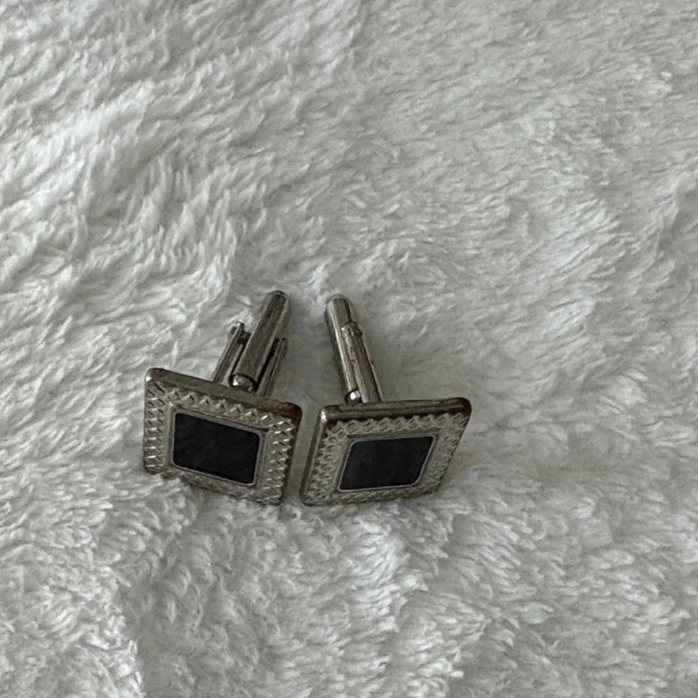 Elegant Silver and Black Cufflinks